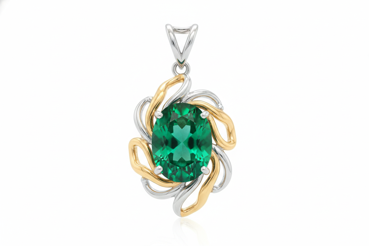 Dije de plata con esmeralda y lineas en oro 18k